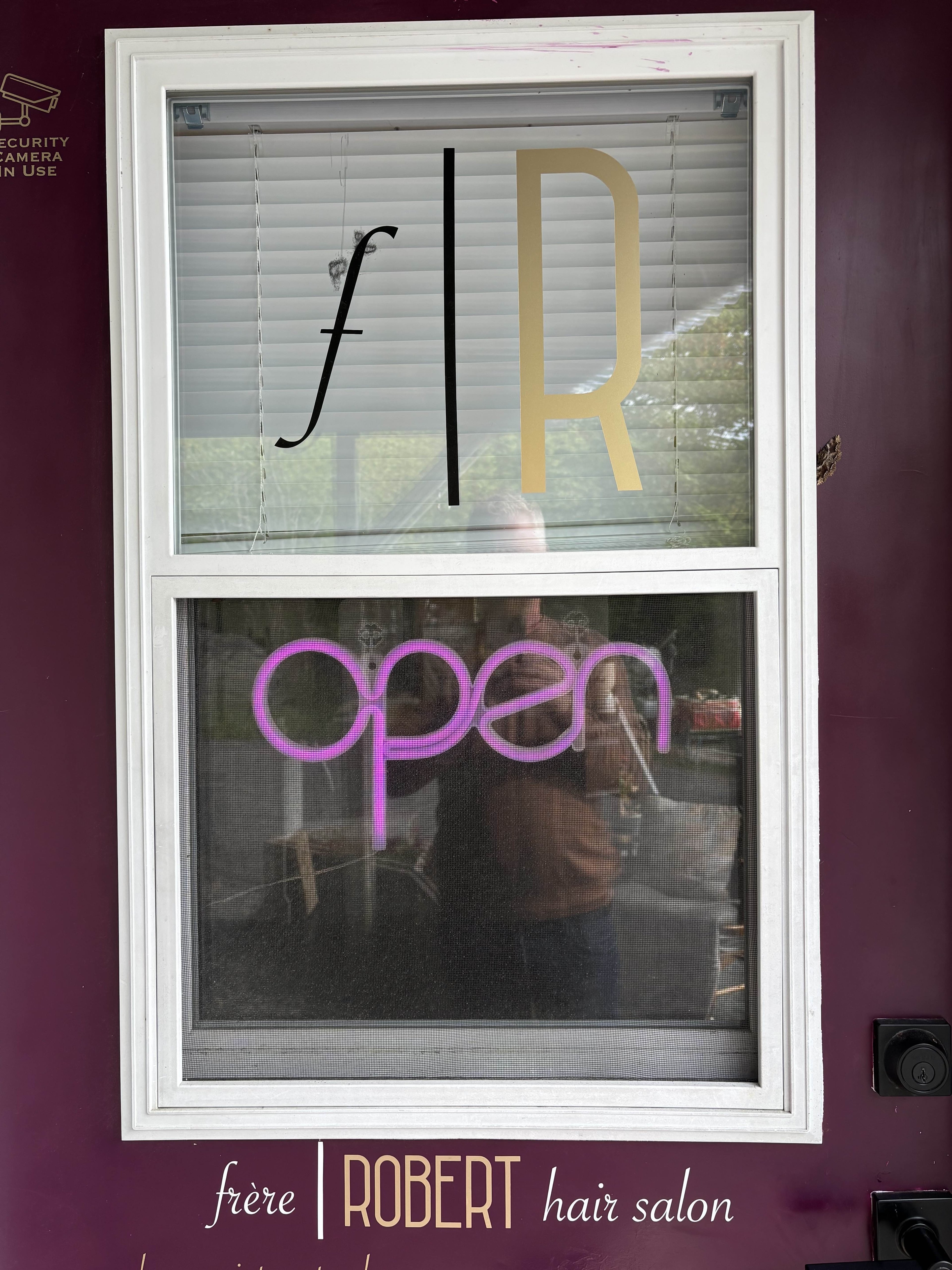 Salon entrance with open sign